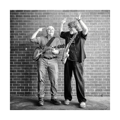 Camile Baudoin & Dave Malone of The Radiators joking around for me while I made portraits for my Six String Slingers project to benefit The Roots of Music program in New Orleans. *50% OF THE PROFITS FROM THIS IMAGE GO TO THE ROOTS OF MUSIC PROGRAM WHICH HELPS TEACH CHILDREN IN NEW ORLEANS HOW TO BE PART OF A MARCHING BAND. IN ADDITION IT OFFERS TUTORING AND A MEAL.